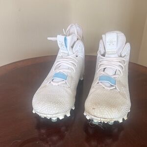 New Balance White and Light Blue Athletic Cleats